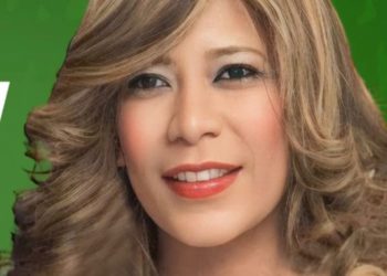 Radhamés Jiménez juramenta en la FP a Carmen Ramírez, dirigente política del exterior.