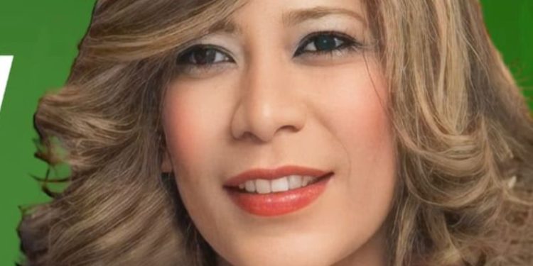 Radhamés Jiménez juramenta en la FP a Carmen Ramírez, dirigente política del exterior.