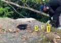 Hallan dos cadáveres con impactos de bala en un precipicio