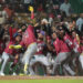 Marcell Ozuna celebra su jonrón con las bases llenas en la victoria de los Gigantes del Cibao sobre los Leones del Escogido.