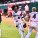 Gigantes del Cibao celebran su victoria 6-5 sobre los Toros del Este en el Estadio Julián Javier.